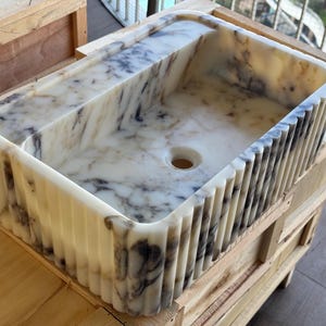 Handcarved Calacatta Viola marble fluted vessel sink by Marblyart, custom made to order — photo 7 of 11