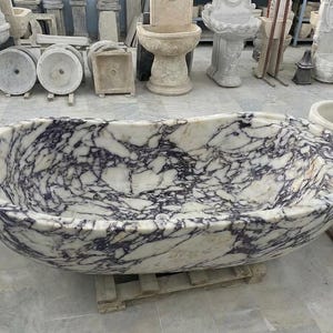 Handcarved Calacatta Viola marble freestanding bathtub by Marblyart, custom made to order — photo 12 of 13