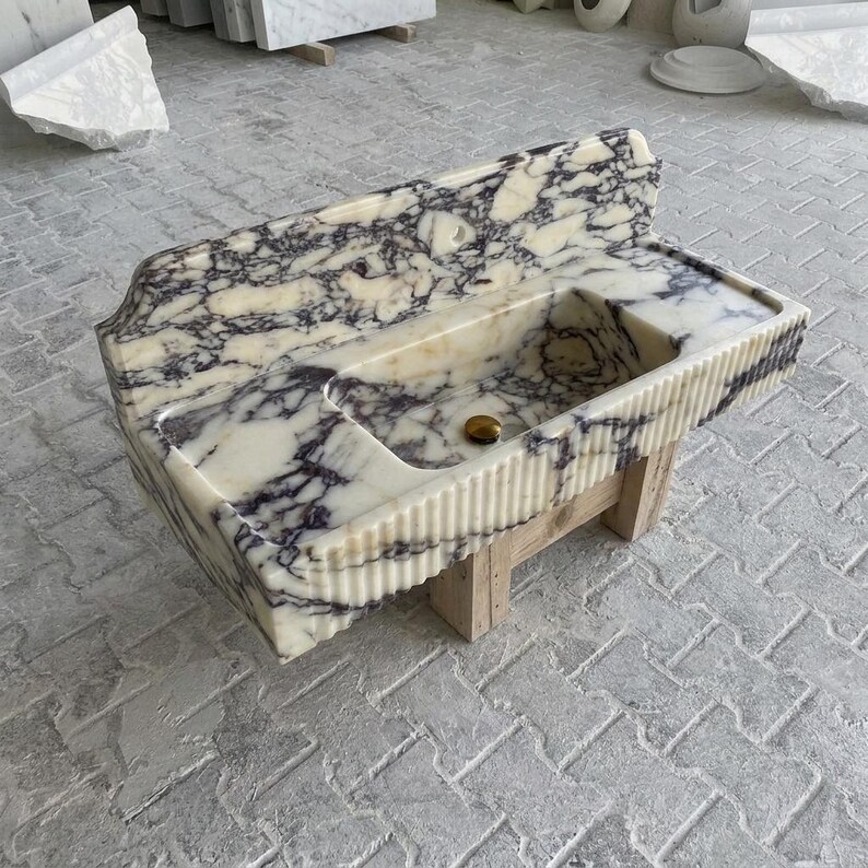 Calacatta Viola Marble fluted vessel sink — isometric three-quarter view (photo 8)