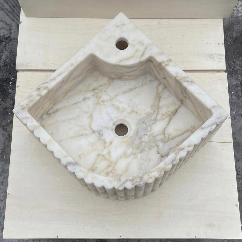 Calacatta Gold Marble fluted vessel sink — top-down view (photo 5)