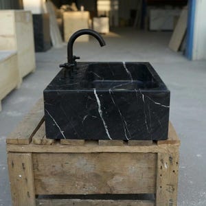 Handcarved Nero Marquina marble vessel sink by Marblyart, custom made to order — photo 4 of 17