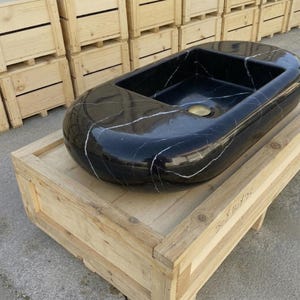 Nero Marquina Marble round vessel sink — left side view (photo 4)