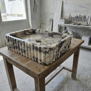 Handcarved Calacatta Viola marble vessel sink by Marblyart, custom made to order — photo 14 of 15