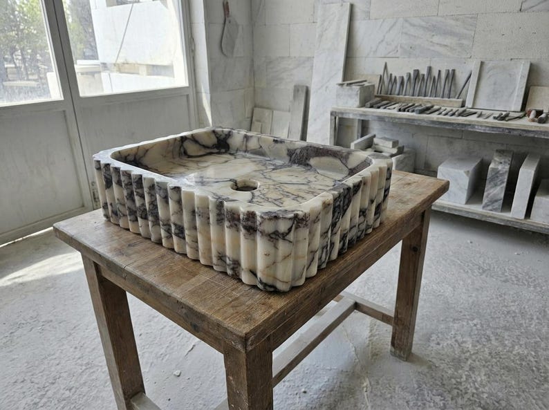 Handcarved Calacatta Viola marble vessel sink by Marblyart, custom made to order — photo 14 of 15