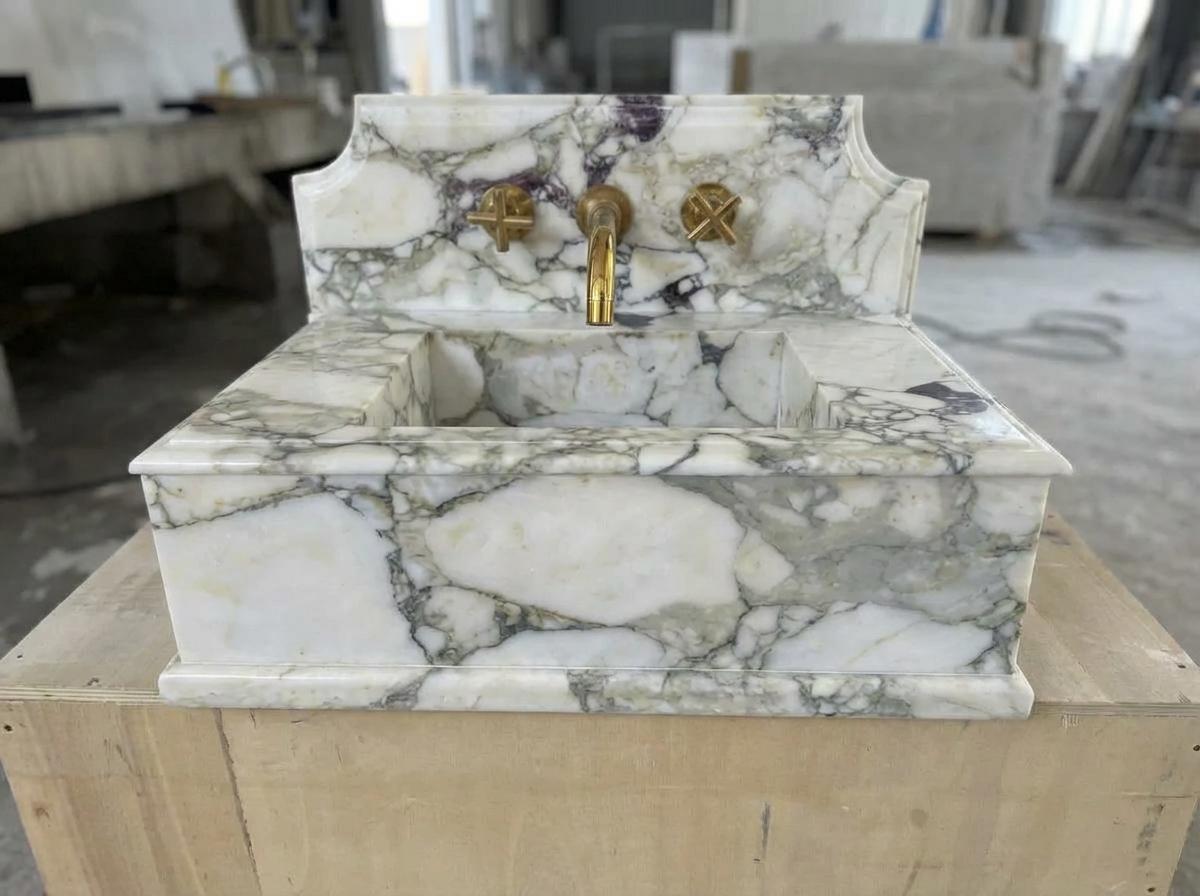 Handcarved Calacatta Monet marble wall mounted sink by Marblyart, custom made to order — photo 3 of 11