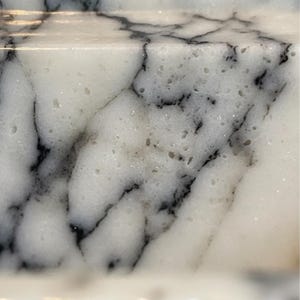 Handcarved Calacatta Viola marble wall mounted sink by Marblyart, custom made to order — photo 3 of 11