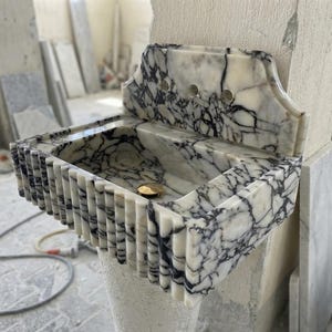 Handcarved natural marble marble floating vanity sink by Marblyart, custom made to order — photo 12 of 13