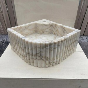 Calacatta Gold Marble fluted vessel sink — front view (photo 11)