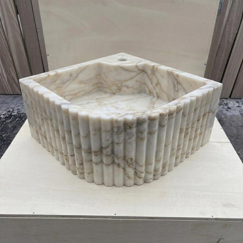 Calacatta Gold Marble fluted vessel sink — front view (photo 11)