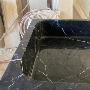 Handcarved Nero Marquina marble vessel sink by Marblyart, custom made to order — photo 2 of 13
