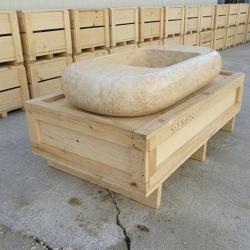 Beige Travertine fluted vessel sink — low-angle view (photo 15)