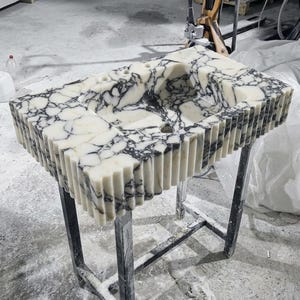 Calacatta Viola Marble wall mount sink — isometric three-quarter view (photo 9)