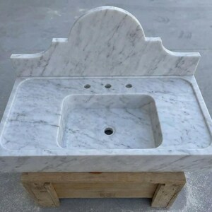 Handcarved Carrara marble floating vanity sink by Marblyart, custom made to order — photo 12 of 15