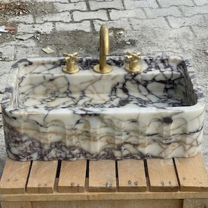Handcarved Calacatta Viola marble wall mounted sink by Marblyart, custom made to order — photo 8 of 15