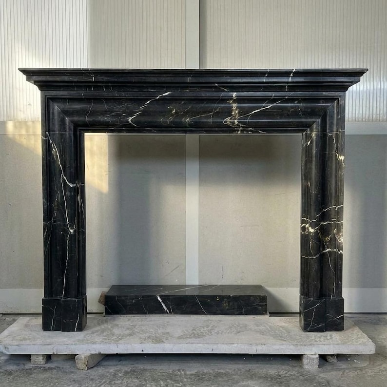 Handcarved Nero Marquina marble fireplace mantel by Marblyart, custom made to order — photo 10 of 11