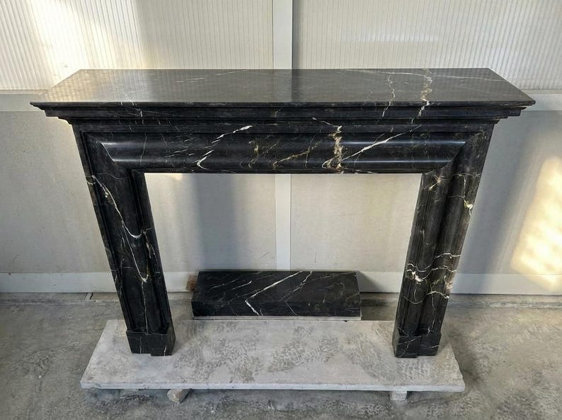 Handcarved Nero Marquina marble fireplace mantel by Marblyart, custom made to order — photo 6 of 11