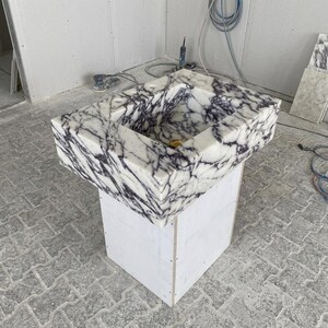 Calacatta Viola Marble wall mount sink — full wide shot (photo 17)