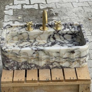 Handcarved Calacatta Viola marble wall mounted sink by Marblyart, custom made to order — photo 12 of 15