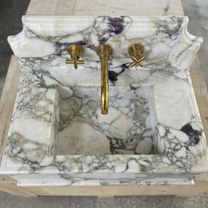 Handcarved Calacatta Monet marble wall mounted sink by Marblyart, custom made to order — photo 11 of 11
