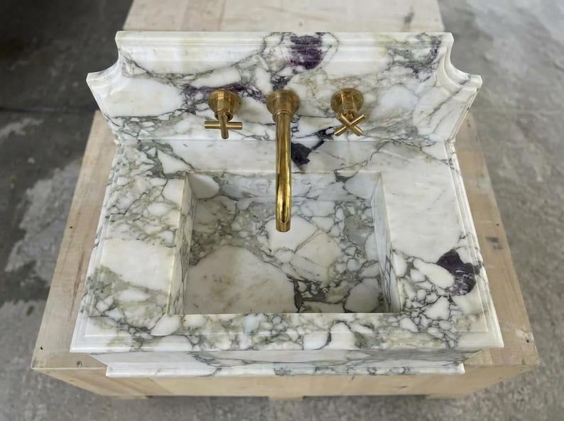 Handcarved Calacatta Monet marble wall mounted sink by Marblyart, custom made to order — photo 11 of 11