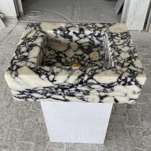 Calacatta Viola Marble wall mount sink — eye-level view (photo 20)
