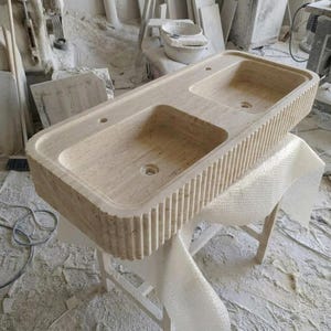 Beige Travertine fluted vessel sink — isometric three-quarter view (photo 3)