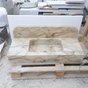 Handcarved Calacatta Gold marble floating vanity sink by Marblyart, custom made to order — photo 11 of 14