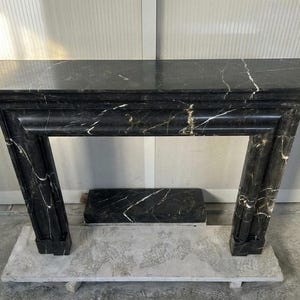 Handcarved Nero Marquina marble fireplace mantel by Marblyart, custom made to order — photo 9 of 11
