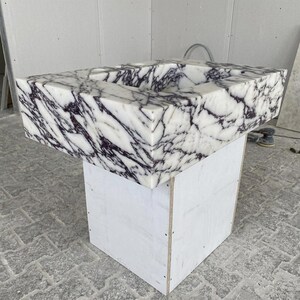 Calacatta Viola Marble wall mount sink — low-angle view (photo 15)