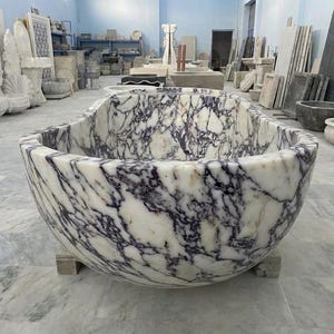 Handcarved Calacatta Viola marble freestanding bathtub by Marblyart, custom made to order — photo 8 of 13