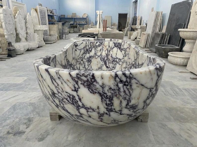 Handcarved Calacatta Viola marble freestanding bathtub by Marblyart, custom made to order — photo 8 of 13