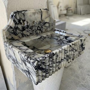 Handcarved natural marble marble floating vanity sink by Marblyart, custom made to order — photo 11 of 13