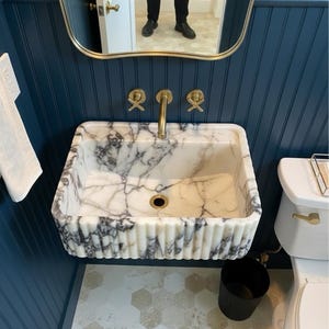 Handcarved Calacatta Viola marble wall mounted sink by Marblyart, custom made to order — photo 8 of 11