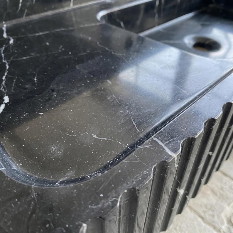 Nero Marquina Marble fluted vessel sink — close-up of marble veining (photo 16)