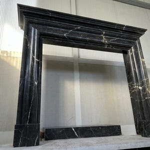 Handcarved Nero Marquina marble fireplace mantel by Marblyart, custom made to order — photo 5 of 11
