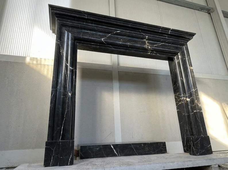 Handcarved Nero Marquina marble fireplace mantel by Marblyart, custom made to order — photo 5 of 11
