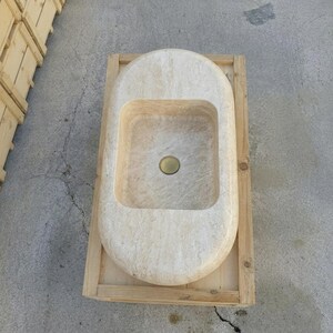 Beige Travertine fluted vessel sink — top-down view (photo 6)