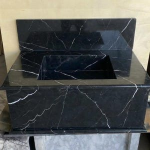 Handcarved Nero Marquina marble wall mounted sink by Marblyart, custom made to order — photo 3 of 13