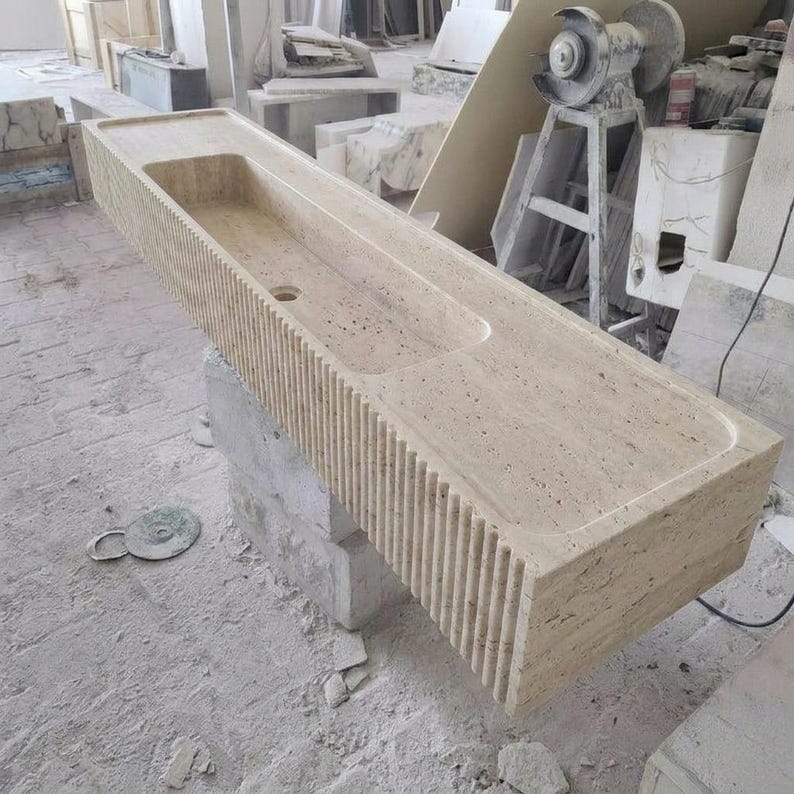Beige Travertine fluted vessel sink — isometric three-quarter view (photo 5)