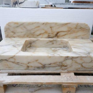 Handcarved Calacatta Gold marble floating vanity sink by Marblyart, custom made to order — photo 10 of 14