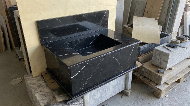Handcarved Nero Marquina marble wall mounted sink by Marblyart, custom made to order — photo 2 of 13