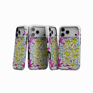 May include: Four white phone cases with a repeating pattern of yellow, pink, and blue cartoon figures. The cases have a glossy finish and a camera cutout on the back. The figures have star-like shapes and are outlined in black.