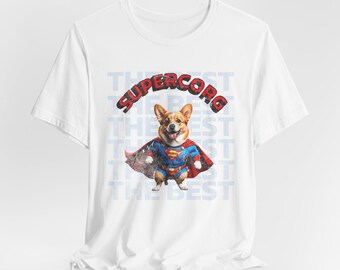 May include: White t-shirt with a corgi in a Superman costume, including a cape and the "S" logo. The words "Supercorg" are printed above the corgi in red and blue, with "The Best" repeated in the background.