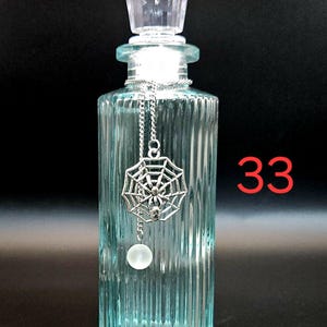 Moonwater & Sunwater Potion Jar - Colored Glass Witch Bottle for Rituals and Spells 33 Spider on Web