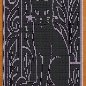 May include: A black cat design on a square, decorative piece. The cat is sitting, with a detailed outline in a lighter color. The background features floral and geometric patterns. The piece is set against a light wood surface.
