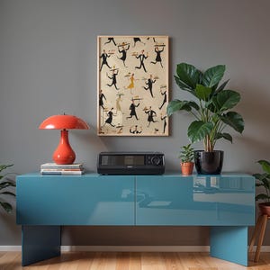 May include: A teal blue cabinet with a glossy finish, holding a black microwave and a red mushroom-shaped lamp. A framed print with figures carrying trays hangs above. Potted plants in various sizes and a wooden plant stand complete the scene.