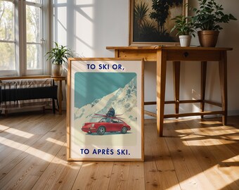 May include: Framed poster with a vintage ski theme. The artwork features a red sports car with skis on top, set against a backdrop of snow-capped mountains and a teal sky. Text reads "TO SKI OR, TO APRÈS SKI."