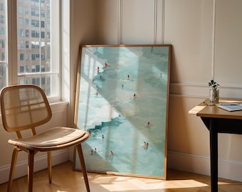 May include: A framed art print depicts a serene scene of people swimming in a turquoise body of water. The artwork, with a light wood frame, is leaning against a wall next to a window and a wooden chair. The room is bathed in natural light.