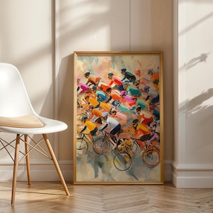May include: A framed art print depicting a cycling race. The artwork features a colorful, impressionistic style with cyclists in motion, wearing various colored jerseys. The gold frame complements the vibrant hues of the painting, creating a dynamic and energetic visual.