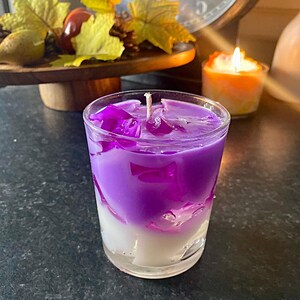 Lavender latte candle, a gourmet touch that enhances your kitchen decor and diffuses a soft, decorative light.